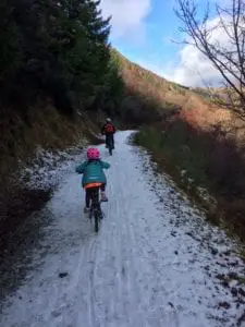 Young child riding the Bridges Trail in Winter
