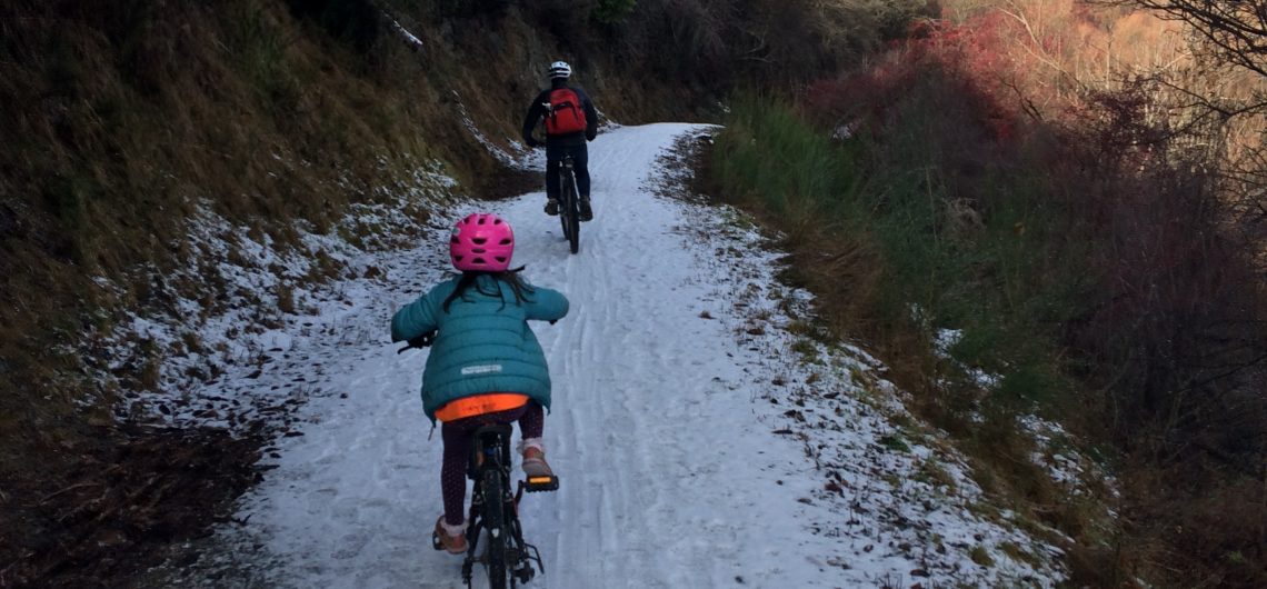 Young child riding the Bridges Trail in Winter