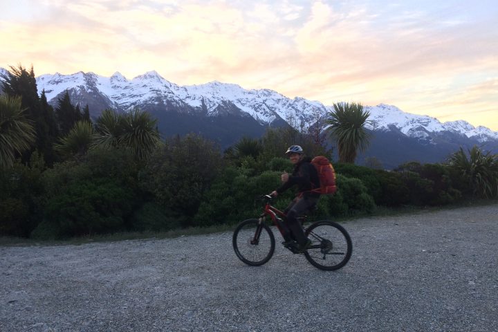 Leif E-biking to a hut after work